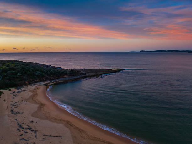 istock High cloud sunrise over the beach and mountain 1434221375