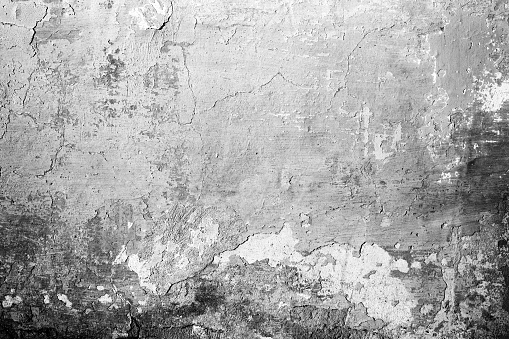 Gray cracked obsolete wall texture background