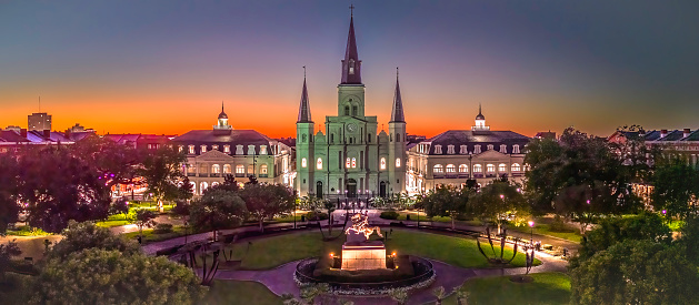 Jackson Square with St.Louis Cathedral at sunset.
In front of the Cathedral is a bronze statues of General Andrew Jackson.
sculpture was completed in December 1855 by artist Clark Mills