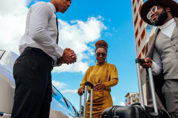 istock African American couple boarding limo. 1434225119