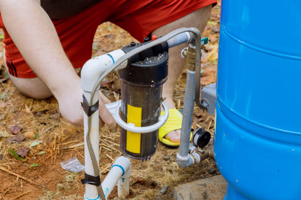 istock Maintenance performed by professional workers replacement of replaceable filters for cleaning water in outside near the home 1434226413