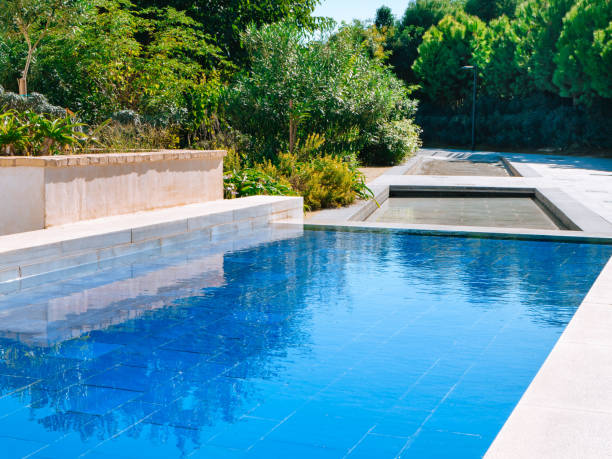 istock city park view with bushes and artificial reservoir whose bottom is decorated with blue tiles 1434232590