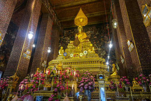 The interior of Wat Pho buddhist temple in Bangkok, Thailand.