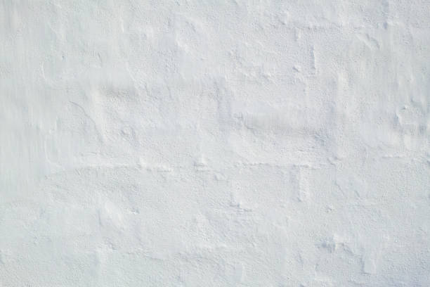 istock Coarse cement plaster wall for white background. Rough textured background. Black and White for old white retro wall background for the background. can be beautifully assembled into the decoration. 1434245248