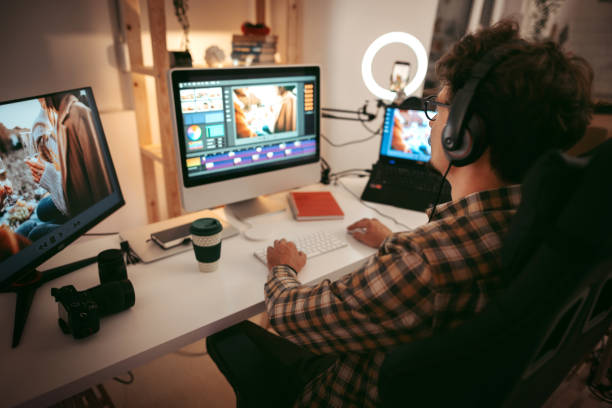 istock Young man editing video at the home office 1434250826