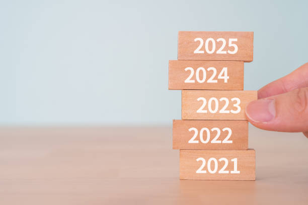 istock Wooden blocks with letters and a human hand. 1434253700