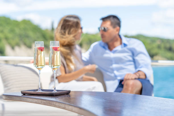 istock Two glasses of sparkling wine with fresh strawberries 1434263055