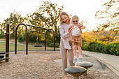istock Mom And Toddler Daughter Playing at the Park 1434263190