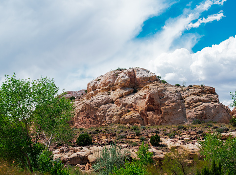 Mountain and storm clouds in the distance at Capitol Reef National Park