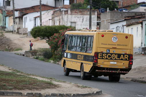 jaguaquara, bahia, brazil - october 14, 2022: school transport bus from the school paths project traveling along the BR 116 highway in the city of Jaguaquara.