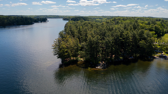 Aerial view of Joseph Lake in Muskoka Ontario during a sunny summer morning.