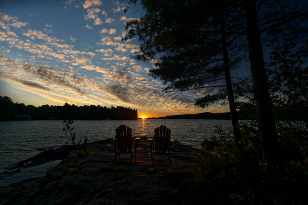 istock Adirondack chairs on a rock in Muskoka 1434277679
