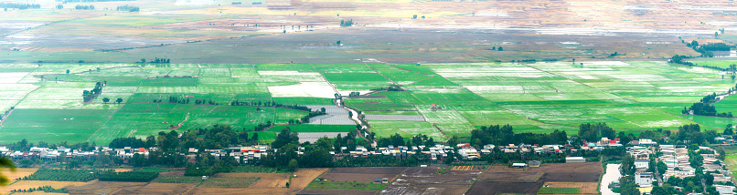 Bird's-eye view of farmland and buildings in the urban-rural fringe area