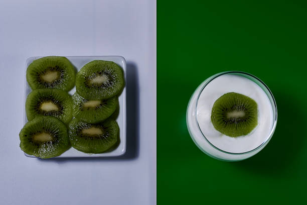 istock Yoghurt glass with kiwi fruit and plate 1434282647