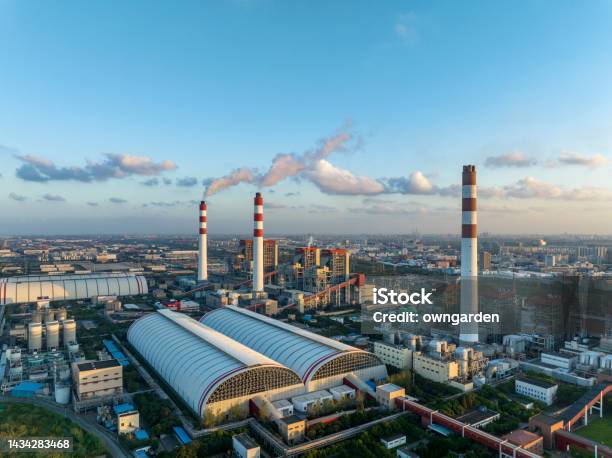 Aerial View Of Thermal Power Generation At Sunset Stock Photo - Download Image Now - Carbon Neutrality, Factory, Fumes