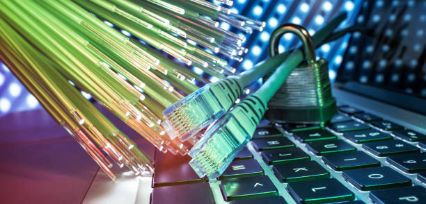 lock and network cable with fiber optical background - fiber optic computer network cable network server imagens e fotografias de stock