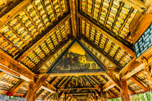 Painted Panel Spreuer Wooden Covered Footbridge Kapellbrucke Over Reuss River Lucerne Switzerland. Built 1408 Panels painted 1600s by Meplinger Dance of Death Death is everywhere
