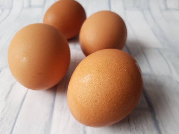 istock Chicken egg photography on white background 1434290378