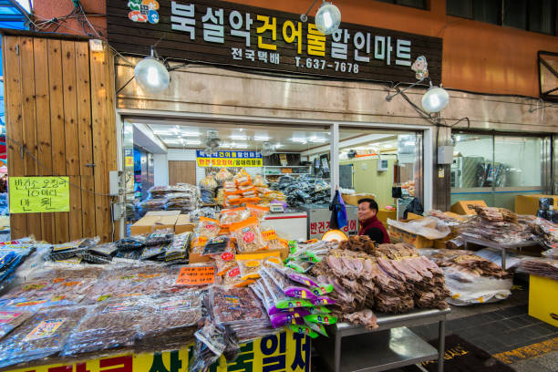 Central Sokcho market. The man sells fish. stock photo