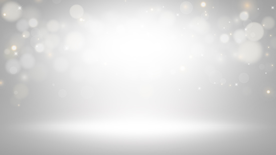 Empty dark gray room with gradient gray background and Abstract white bokeh lights effect background.