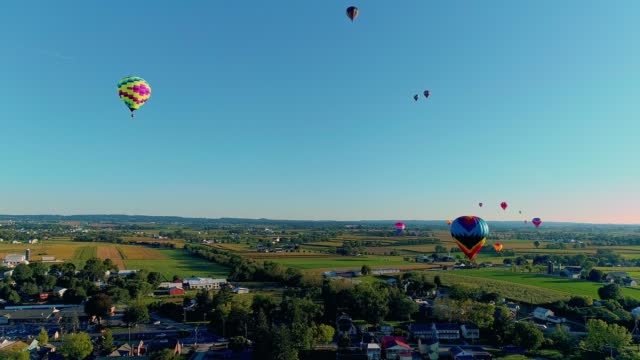 Drone View of a Multiple Hot Air Balloons Floating in the Sky During a Balloon Festival