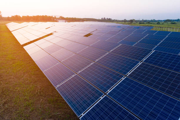 istock Solar Farm with sunset on the background 1434304041