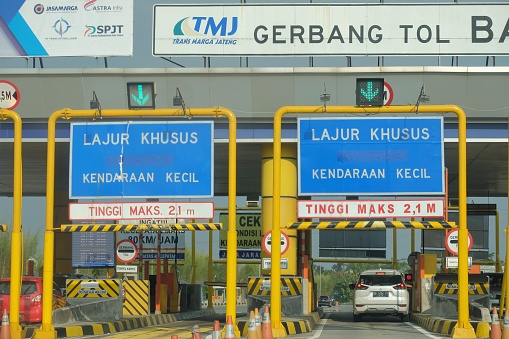 Semarang, Indonesia, Sept 19, 2020. Vehicles entered the Colomadu toll gate queue.