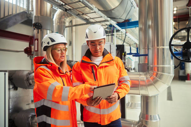 istock Engineers working on a digital tablet in a power station 1434305634