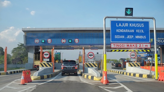Semarang, Indonesia, Sept 18, 2020. Vehicles entered the Colomadu toll gate queue.