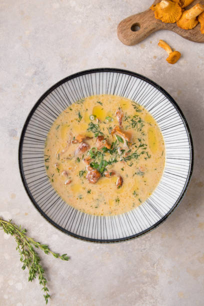 istock Corn chowder soup in white bowl on concrete background. 1434318161