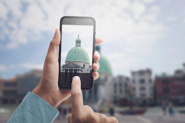 istock Tourist taking pictures with her smartphone 1434321773