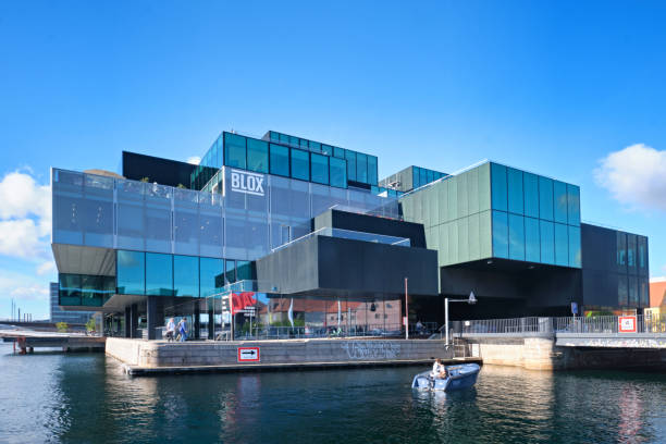 Berlin, Germany - 18. November 2022: The modern, self-sufficient The Cube office building at the main railway station in the sunlight.