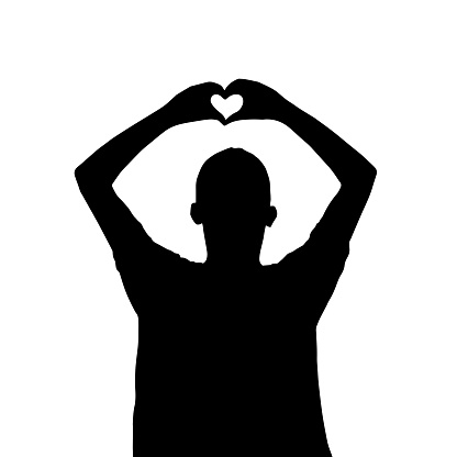 Heart sign from hands. Silhouette of a person showing heart vector.