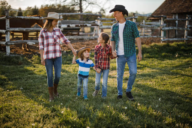 istock Happy family enjoying in their walk on a ranch. 1434332441