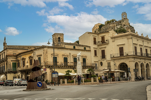 Modica, Italy: 09-21-2022: Beautiful square in Modica with the castle in background