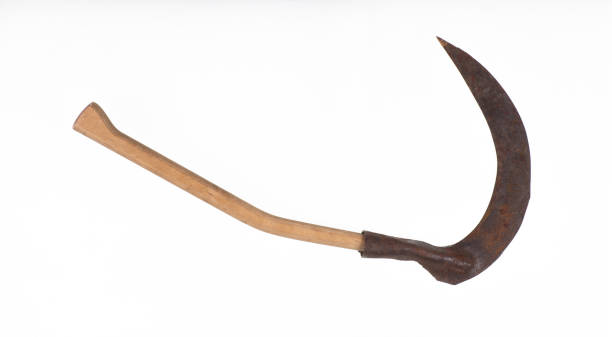 istock halloween scythe with sharp blade isolated on white background 1434342297