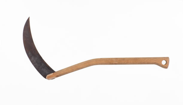 istock halloween scythe with sharp blade isolated on white background 1434344406