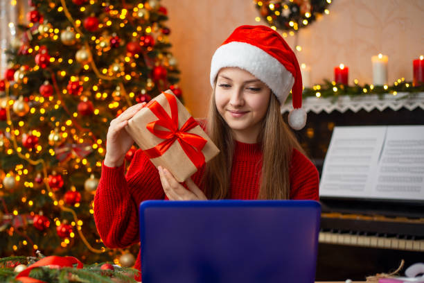 istock Girl shows her present to a friend, while having a video-call 1434348129