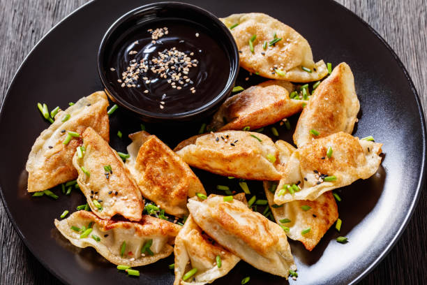 istock gyoza, wonton wrappers stuffed with pork, cabbage 1434349123
