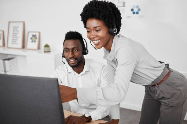 istock Contact us, customer service or call center agent with help, support and consulting coworker with 404 error on computer. Collaboration, consultation and teamwork on technology, glitch or company web. 1434354201
