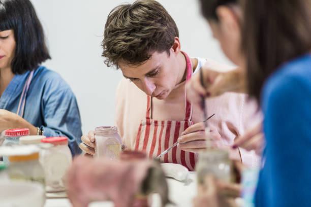 istock Group of people learning ceramic art 1434354668