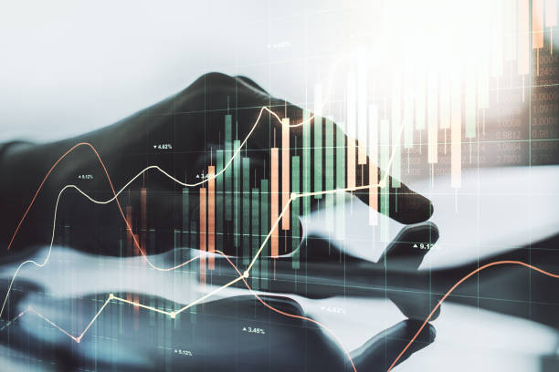 istock Multi exposure of abstract creative financial graph with finger presses on a digital tablet on background, forex and investment concept 1434354677