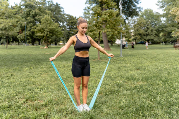 istock Healthy slim instructor with a resistance band 1434356000