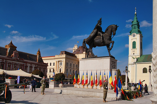 Oradea, Romania - 15 October 2022 : Statue of King Ferdinand I in the city center marking a 100 year coronation anniversary