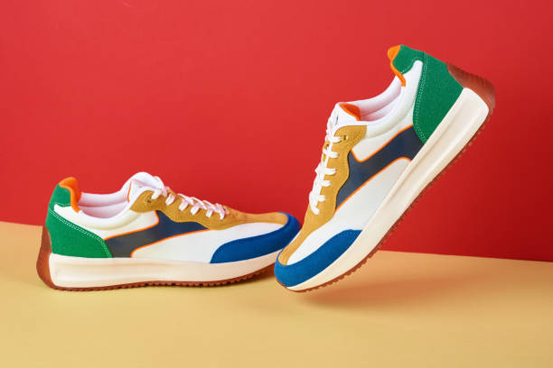 istock Stylish trendy shoes on colorful background 1434359636