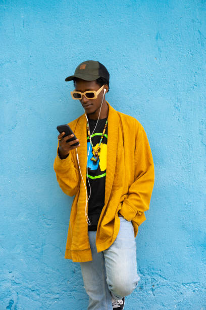 istock Young hip man concentrating on his phone 1434359948