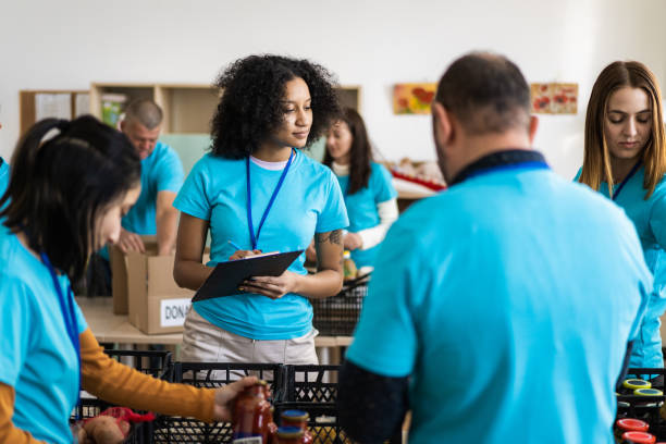 istock Volunteers offering life saving assistance 1434362550