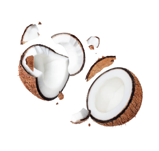 istock Crushed coconut close up in the air isolated on white background 1434365833