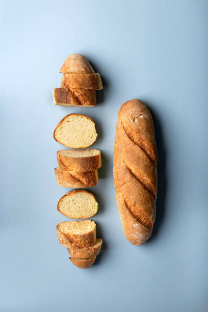 istock fresh wheat flour baguette on a blue background 1434368779