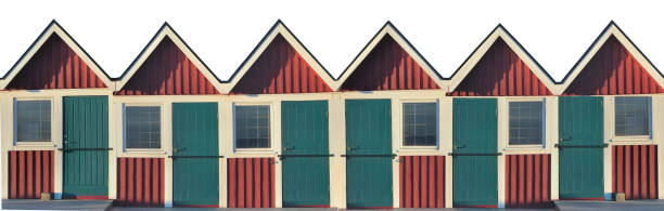 istock front view of beach cabins in Sweden aligned under white background 1434372220